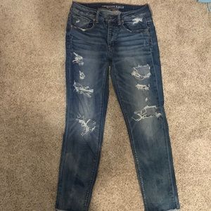 Medium wash lightly distressed American Eagle Strech Jegging